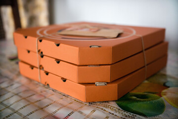 Stack of craft pizza boxes