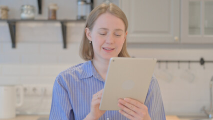Portrait of Young Woman Doing Video Chat on Tablet