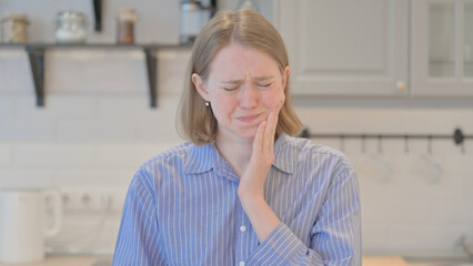 Portrait of Young Woman with Toothache