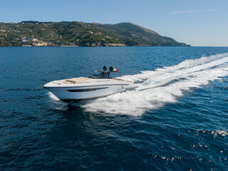 Fototapeta na wymiar Aerial view of a luxury yacht in the mediterranean sea. napoli coast
