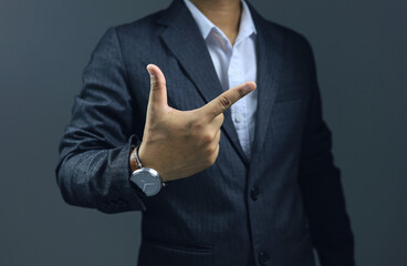 Manager or supervisor making a check mark hand gesture showing acceptance, validity, permission, approval. Body language communication concept.