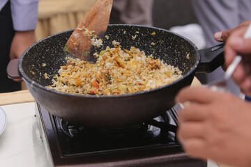 fried rice being cooked. Indonesian special food