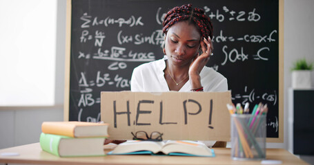 Frustrated Sad College Teacher With Help Sign