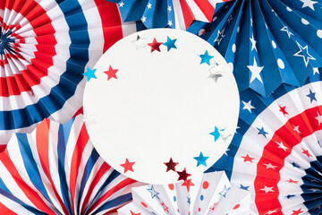 Obraz premium 4th of July background, USA Presidents Day, Independence Day, Memorial day, US election concept. Red white and blue paper fans with stars confetti. Flat lay, top view, banner