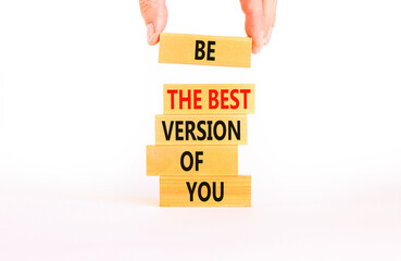 Motivational and inspirational symbol. Concept words Be the best version of you on wooden block. Beautiful white background Businessman hand. Business motivational inspirational concept. Copy space.