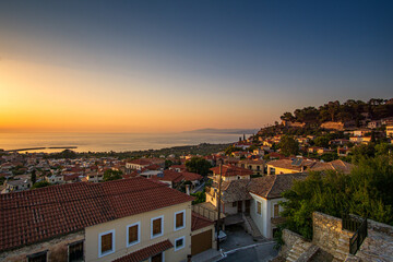 Fototapeta premium Beautiful sunset view by the historical castle of Kyparissia coastal town at sunset. Located in northwestern Messenia, Peloponnese, Greece, Europe.