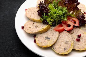 stuffed chicken with lettuce leaves and tomatoes