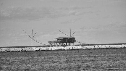 Wooden boathouse and boats on Adriatic Sea