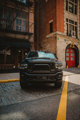 Big truck parking on the street moody afternoon