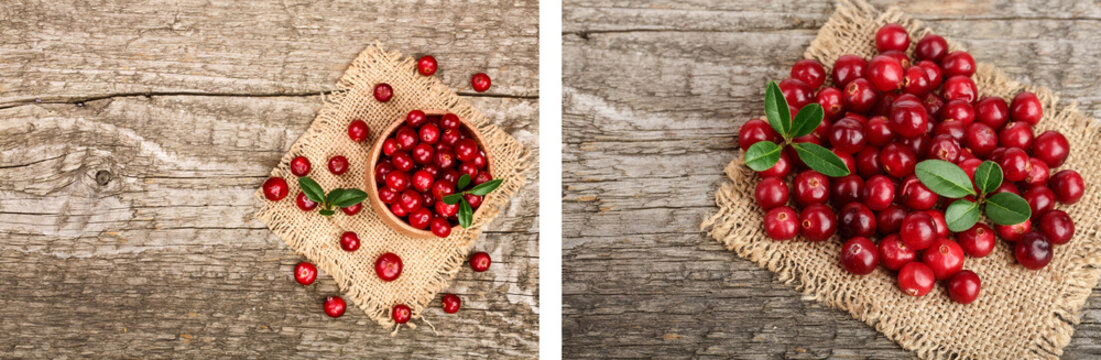 Cranberry with leaf in bowl on old wooden background with copy space for your text. Top view