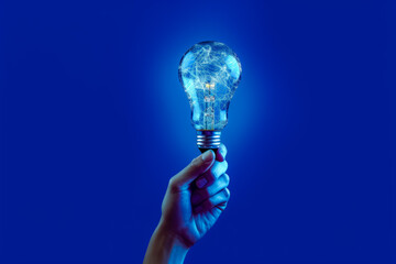Glowing light bulb, idea concept, net art, dark sky-blue and light gray. Generative AI Illustration.
