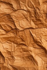 Seamless brown crumpled creased recycled paper texture