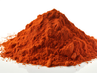 A pile of red paprika powder sits on a white background.