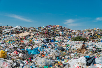 Garbage dump landscape. Open-air landfill. Ecological damage, contaminated land