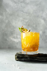 Cold berry lemonade with ice for a hot day. Passion fruit lemonade.