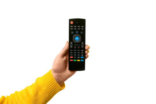 black remote control in hand isolated on transparent background