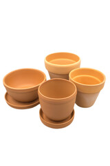 Empty clay flower pots of different shapes isolated on a white background