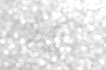 White and gray bokeh background. Photo can be used for the concepts of New Year, Christmas, Wedding Anniversary and all celebrations.	