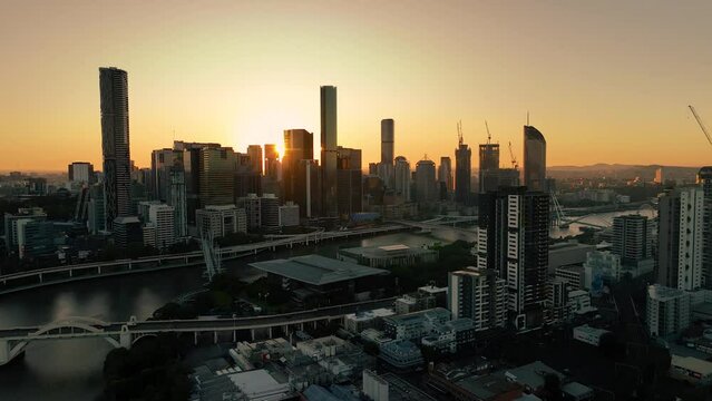2023 - Excellent aerial footage of a Brisbane skyline at sunrise.