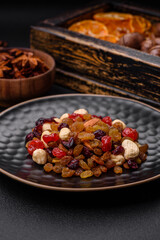 Roasted pecans and macadamia nuts, dried tangerine, dried berries