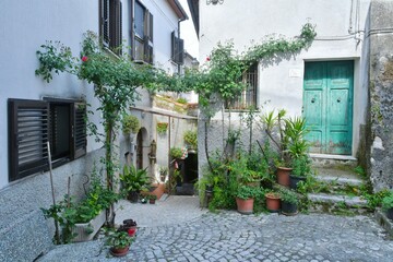 A narrow street of Macchia d'Isernia, a medieval village in the mountains of Molise., Italy.