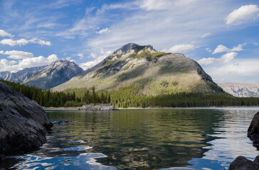 Mountain lake landscape panorama wihout people - 
coniferous forest - pine trees, scenic blue lake,...