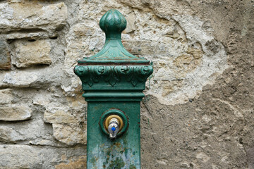 Fototapeta na wymiar city faucet in Bergamo, Italy