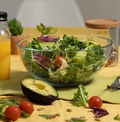 full salad in a bowl resting on the table