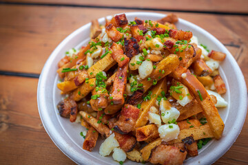 Poutine with pork belly and cheese curds