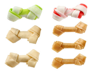 Set with different bone dog treats on white background