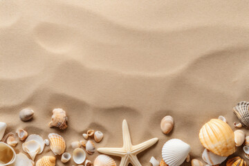 Fototapeta na wymiar Arial view of a sandy beach with shells at the bottom of the picture. Flat top summer concept background with lots of negative space for copy space.