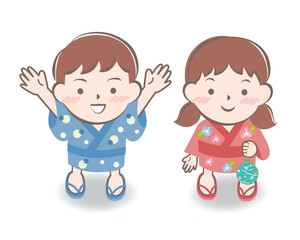 見上げる浴衣姿の子供たち