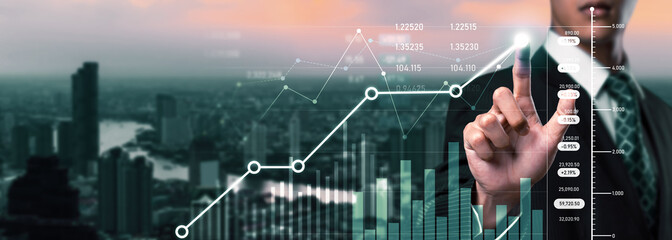 Businessman analyst working with digital finance business data graph showing technology of...