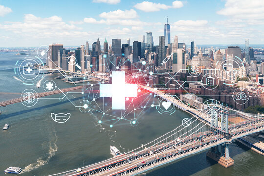 Aerial panoramic city view of Lower Manhattan. Brooklyn and Manhattan bridges over East River, New York, USA. Health care digital medicine hologram. The concept of treatment and disease prevention