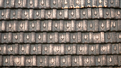 Old ceramic tiles on the roof.