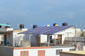 Solar panel system on the terrace in Indian City. Domestic use of Solar Electricity system System 