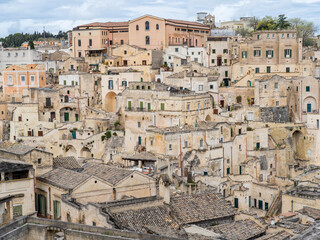 Fototapeta premium Matera, Italy. Amazing view of the Sassi of Matera. Landscape of the historical part of the town. An Unesco World Heritage Site. Touristic destination