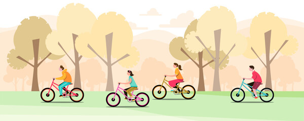 Groups of children ride bicycles in a park having fun during the school holidays.