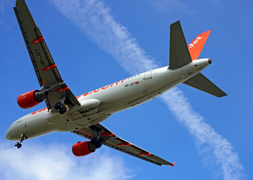 Geneva, Switzerland, Europe - Easyjet - low-cost airline, passenger jet liner landing at Cointrin airport
