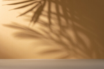 Yellow background with palm leaves shadows.