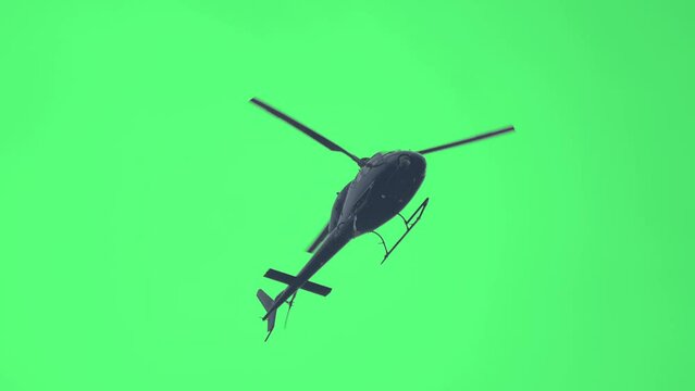 Helicopter flying on green screen low angle camera. Realistic helicopter flying loop animation. Green screen render. Aircraft flight with greenscreen. Aircraft chroma key post production 4k footage.