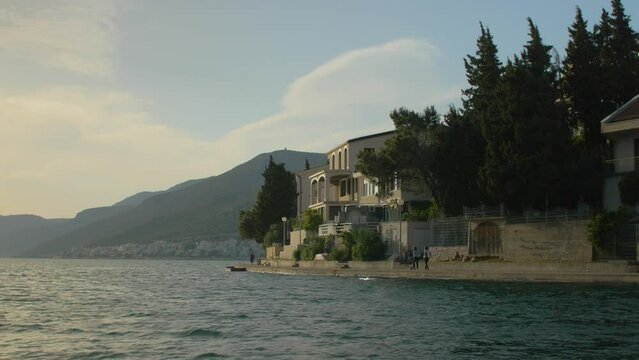 Boat trip in the bay of Neum on the Adriatic Sea with its promenade, in Bosnia