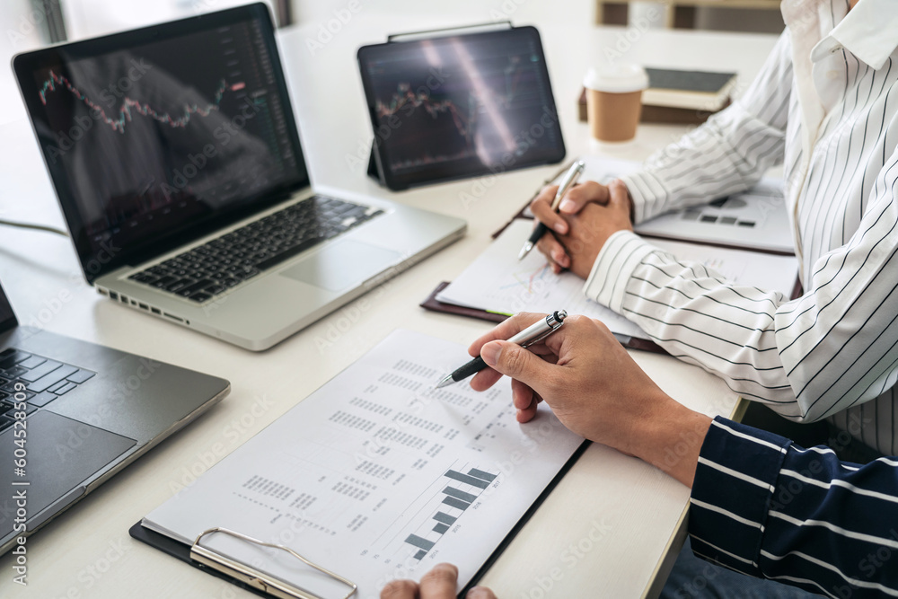 Canvas Prints business trader team using laptop to checking stock market onlin