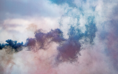Dense multicolour colourful background from smoke. Pink red, blue and white.. Minimal abstract background for presentation