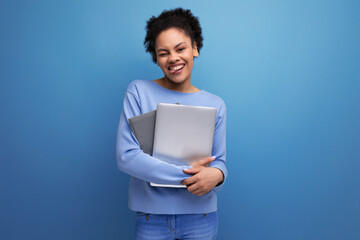 successful young afro hair brunette business woman working using laptop