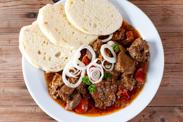 Traditional goulash soup with stew and paprika.