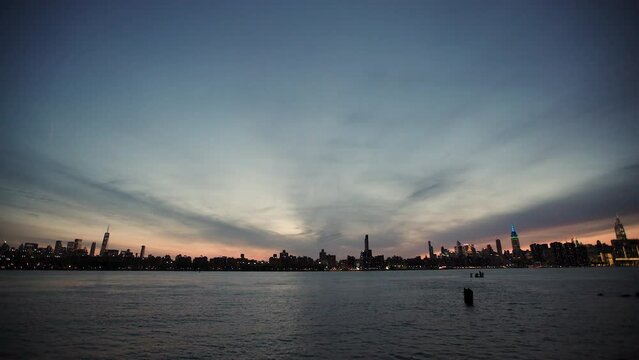 Wide Angle Shot Of Manhattan NYC With Skyline In Silhouette