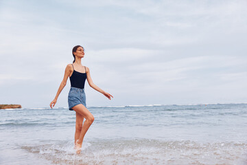 woman sea summer lifestyle travel beach smile sunset positive young running