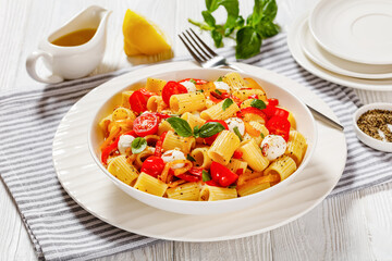 pepper tomato mozzarella pasta salad in bowl