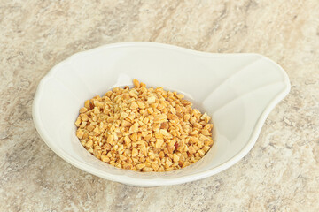 Crunched roasted peanut in the bowl